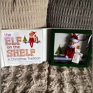 Elf on the shelf with storybook.